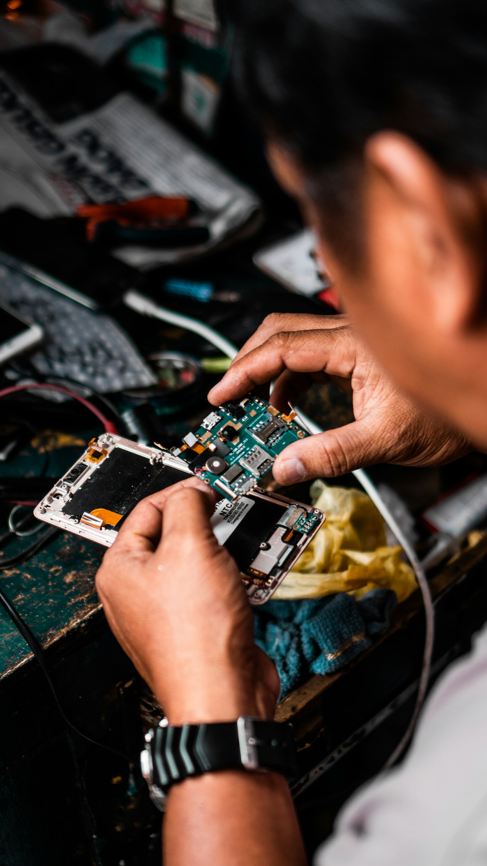 iTechFix technician repairing a phone